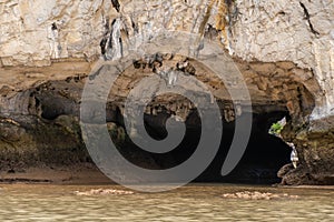 Tunnel cave a place for who love to try kayaking in Halong Bay of Vietnam.