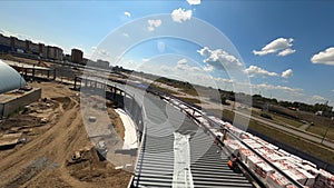 Tunnel corridor and unfinished sports stadium building