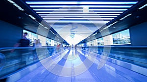 Tunnel with flat escalators in airport of Seoul