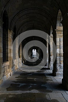 Tunnel formed by stone arches in the Plaza del Obradoiro in Gali photo