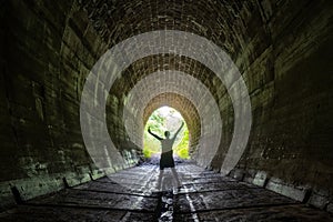 Tunnel with green forest landscape near the village of Slavosovce photo