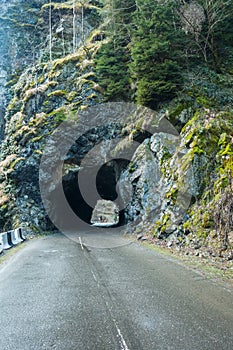 Tunnel in the rock on the road to Svaneti, Georgia
