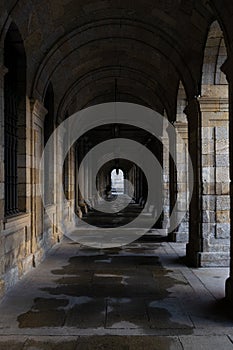 Tunnel of stone arches in the streets of Santiago de Compostela. photo