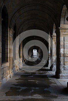 Tunnel of stone arches in the streets of Santiago de Compostela. photo