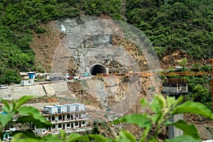 Tunnel under construction at the mountain base in Rudraprayag district, by Northern Railways, connecting lower Himalayan areas and photo