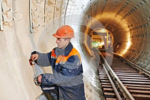 Tunnel worker at underground construction site