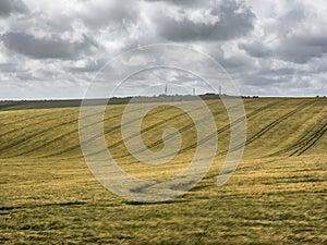 Tunning vibrant landscape image of English countryside on lovely Summer afternoon overlooking rolling hills and country villages