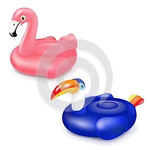 Tuocan And Pink Inflatable Flamingo Swim Rings Isolated