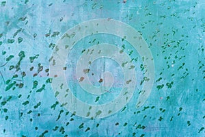 Tuquoise blue aged destroyed weathered metal surface door, green rain drop dots, background texture, copy space photo