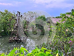 A turbine baler is installed in a garden pond.
