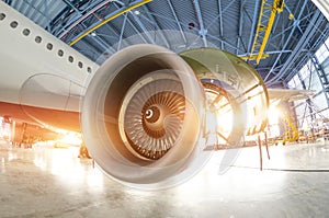 Turbine engine blades during maintenance, the plane in the hangar