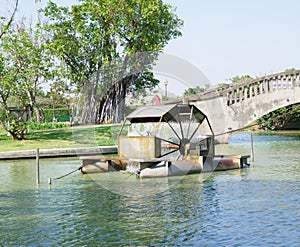 Turbine Rotating Water Bridge and Tree