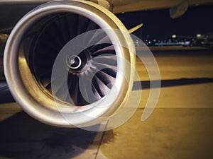 Turboprop aircraft engine closeup shot. Turbine blades of aircraft jet engine.