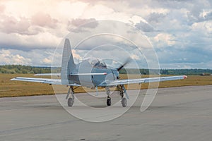 Turboprop small airplane fighter steering wheel on the steering track for take off