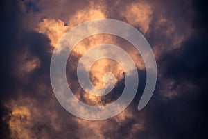 Turbulent Storm Clouds Backlit by the Setting Sun