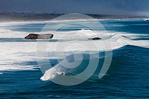 Turbulent water of breaking ocean waves at NZ coast