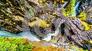 The turbulent waters of the Maligne Canyon flowing through the deep Maligne Canyon in Jasper National Park