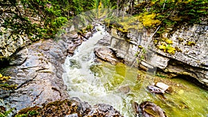 The turbulent waters of the Maligne Canyon flowing through the deep Maligne Canyon in Jasper National Park