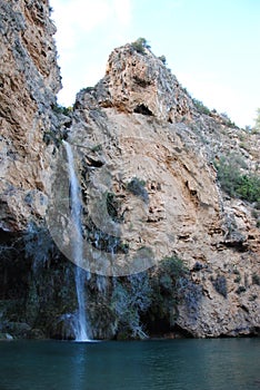 The Turche Cave. Waterfall. BuÃÂ±ol. Spain photo