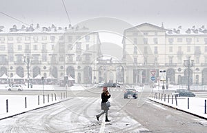 Turin, people in the street under heavy snow