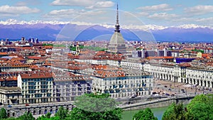 Turin, Torino, aerial timelapse skyline panorama with Mole Antonelliana, Monte dei Cappuccini and the Alps in the