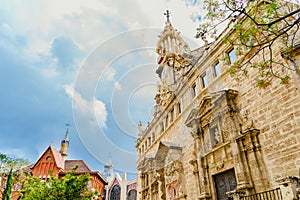 Turistic square Central Market of Valencia, near the Lonja de la Seda, view of the roofs of buildings one day with clouds in the