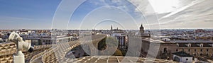 Turistic telescope pointing to old town landmarks, Seville, Spain