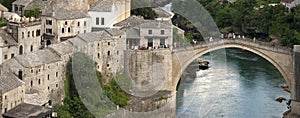 Tourists on the restored bridge of Mostar, Bosnia