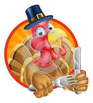 Turkey Bird in Pilgrims Hat Holding Knife and Fork photo