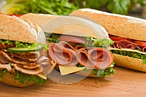 Turkey breast, ham & swiss and salami sandwiches photo