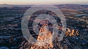 Turkey. Cappadocia. aerial View on rock-castle of Uchisar castle at a sunset