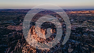 Turkey. Cappadocia. aerial View on rock-castle of Uchisar castle at a sunset