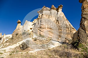 Turkey, Cappadocia. Picturesque cliffs with caves inside them around Cavusin