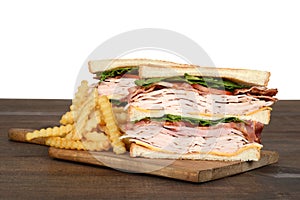 Turkey club sandwich with french fries