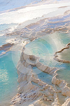 Turkey, Denizli Province, Pamukkale Natural Travertine Thermal Pools at sunset