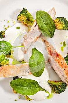 Turkey Fillet with Baked Cabbage Broccoli and Cheese Espuma photo