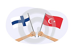 Turkey and Finland flags. Finnish and Turkish national symbols. Hand holding waving flag. Vector