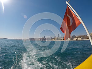 Turkey flag in Bosphorus at the turkish ship vapur photo