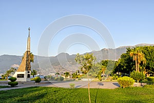 Turkey, Hatay - August 24, 2019: The Monument at iskenderun with trees and mouontain