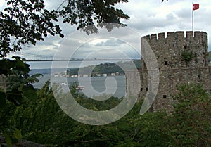 Turkey, Istanbul, Rumeli Hisari castle, view of the Halil Pasha Tower and the Fatih Sultan Mehmet Bridge