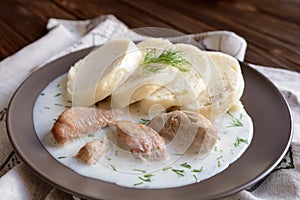 Turkey meat with dill sauce and bread dumpling