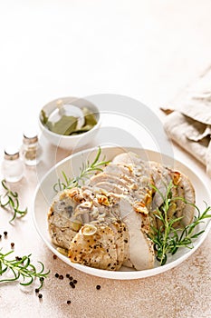 Turkey meat fillet baked with garlic, rosemary and spices
