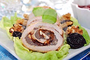 Turkey roulade with prune and walnuts for christmas photo