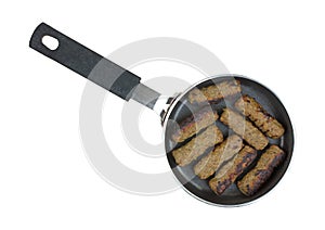 Turkey Sausages Browned Teflon Skillet Top
