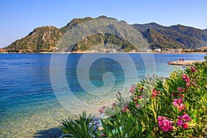 Turkey seashore, white sand seacoast, mediterranean sea, a ship in the water, summer vacation