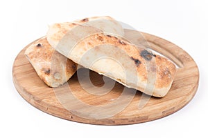 Turkey somun bread on the kitchen cuting wooden board