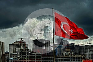 turkey turkish flag waving in front of construction site in istanbul dense population no nature dust clouds no sun