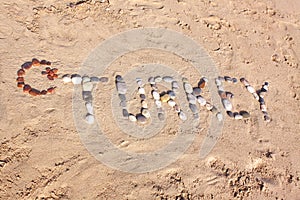 Turkey word written with pebbles on the beach sand