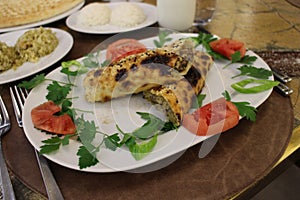 Turkish Adana / Urfa Kebap stock photo. Middle, bulgur.