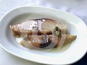 Turkish appetizer Pickled Tunny Fish with Olive Oil
